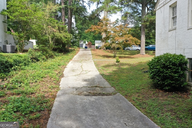 view of yard with central AC unit