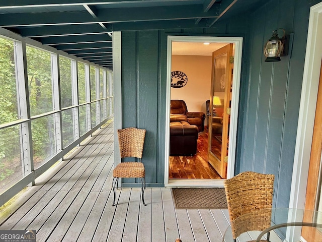 sunroom with plenty of natural light