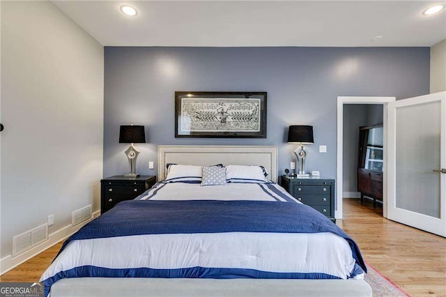 bedroom with light wood-type flooring