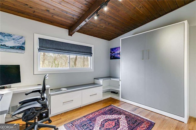 home office featuring wood ceiling, lofted ceiling with beams, and light wood-type flooring