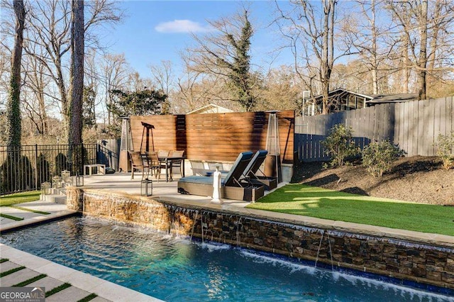 view of swimming pool featuring a patio and pool water feature