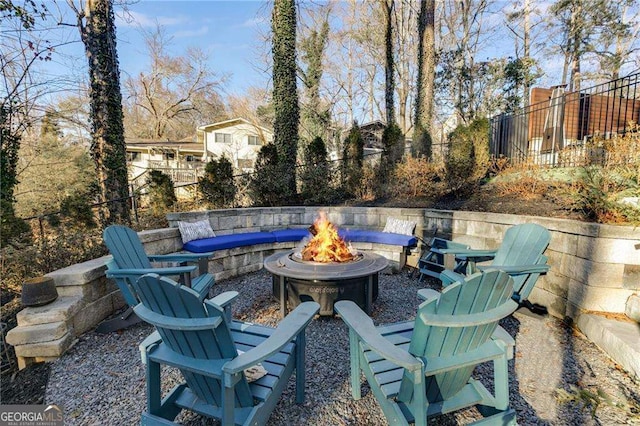 view of patio / terrace with a fire pit