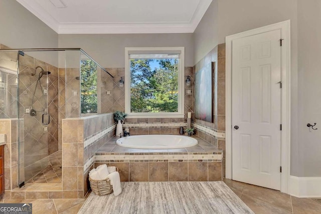 bathroom featuring tile patterned floors, ornamental molding, and independent shower and bath