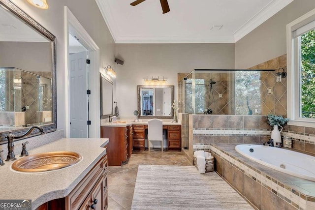 bathroom with ornamental molding, separate shower and tub, a healthy amount of sunlight, and vanity