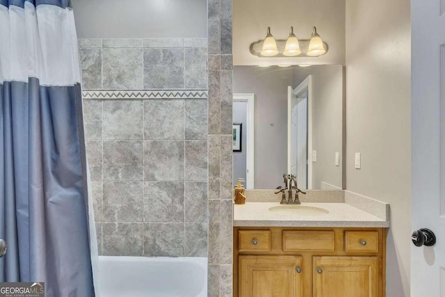 bathroom featuring vanity and shower / bath combination with curtain