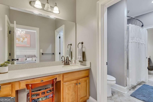 bathroom with vanity, toilet, and walk in shower