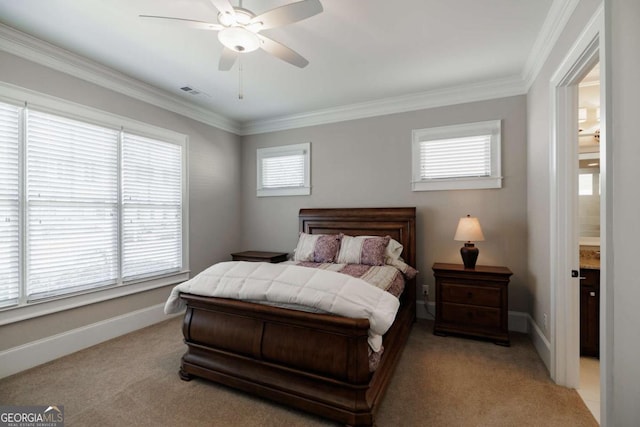 bedroom featuring crown molding, light colored carpet, connected bathroom, and ceiling fan