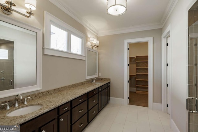 bathroom featuring vanity, an enclosed shower, and crown molding