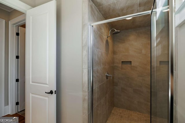 bathroom featuring an enclosed shower