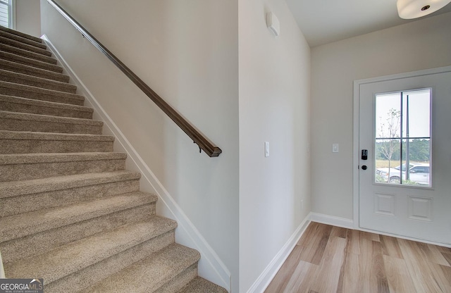 foyer with light hardwood / wood-style flooring