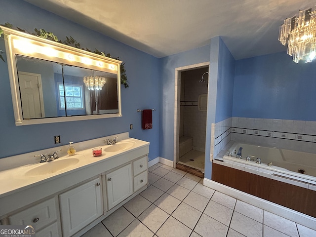 382 Lower Lovelace Rd, West Point, GA 31833 - full bathroom with a chandelier, a jetted tub, a stall shower, double vanity, and tile patterned floors