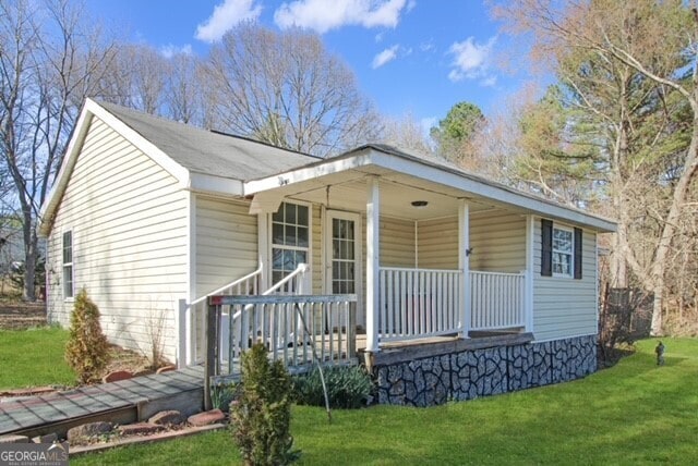 1381 Allgood Rd, Marietta, GA 30062 - view of front of home with a porch and a front lawn