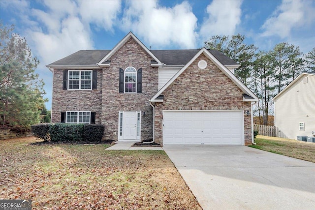 front of property with a garage and a front lawn