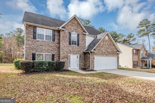 view of property featuring a front lawn