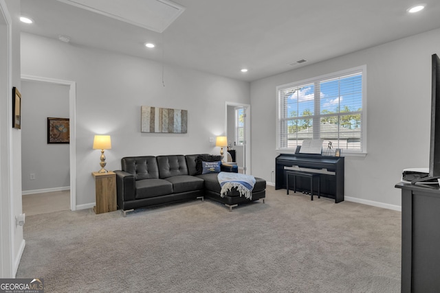 living room with light colored carpet