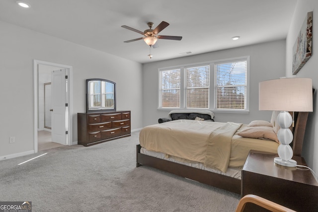 carpeted bedroom featuring ceiling fan