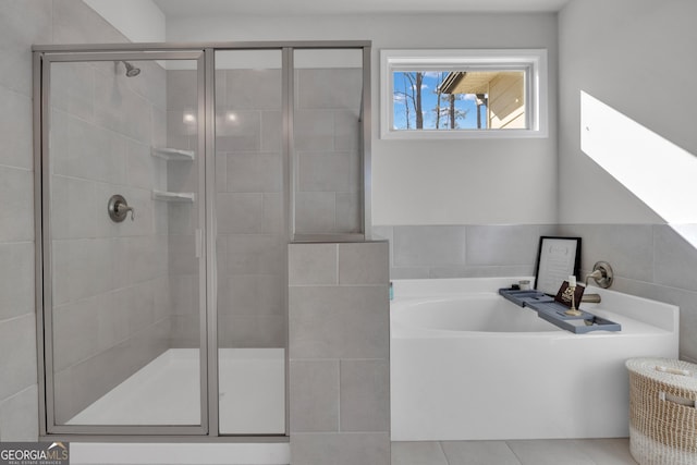720 Lanarck Way, Peachtree City, GA 30269 - bathroom featuring a bath, a shower stall, and tile patterned floors