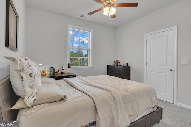 bedroom featuring ceiling fan and carpet floors