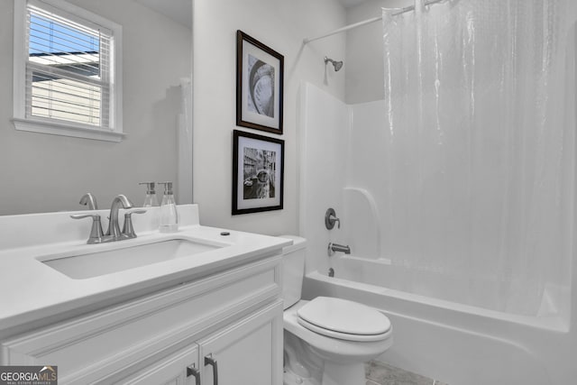 full bathroom featuring vanity, toilet, and shower / tub combo