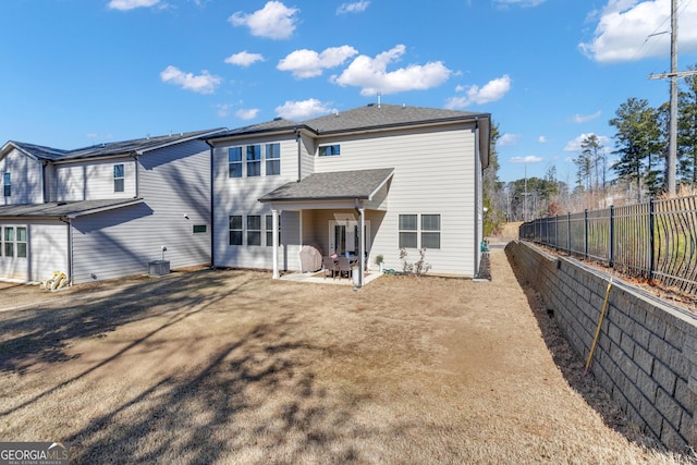 back of house featuring central AC and a patio