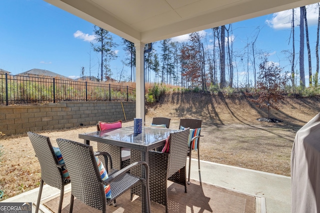 720 Lanarck Way, Peachtree City, GA 30269 - fenced backyard featuring outdoor dining area and a patio area