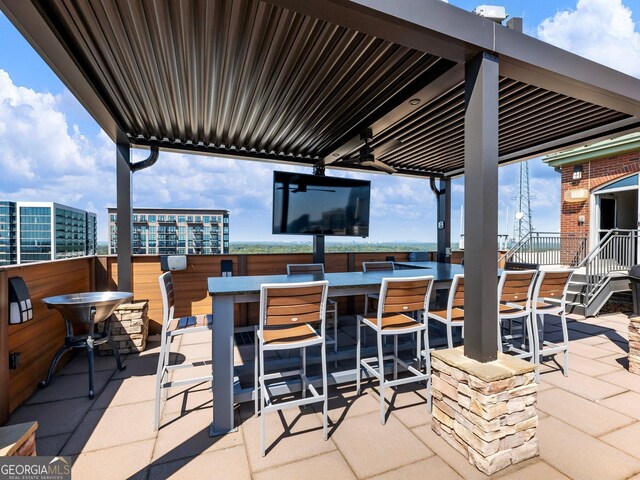 view of patio featuring a bar