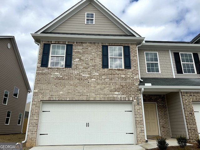 view of front of property featuring a garage