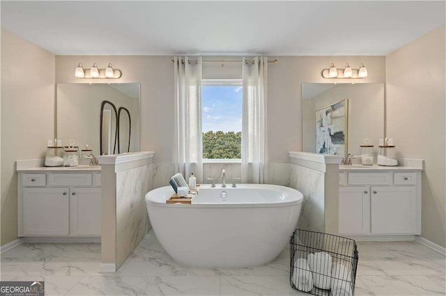 bathroom featuring vanity and a bathtub