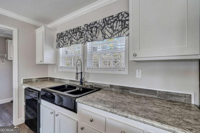 kitchen featuring sink, crown molding, dishwasher, white cabinets, and a textured ceiling