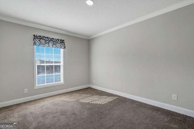 carpeted empty room with crown molding and a textured ceiling