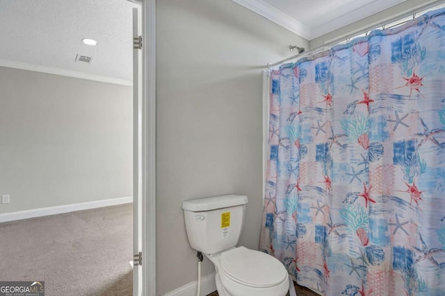 bathroom with crown molding, walk in shower, and toilet