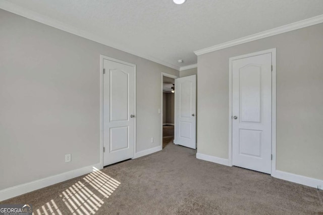 unfurnished bedroom featuring light colored carpet and ornamental molding