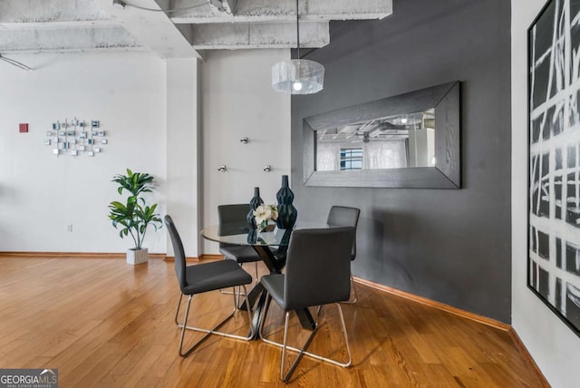 dining room with hardwood / wood-style floors