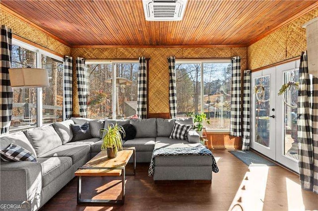 sunroom with wooden ceiling and french doors