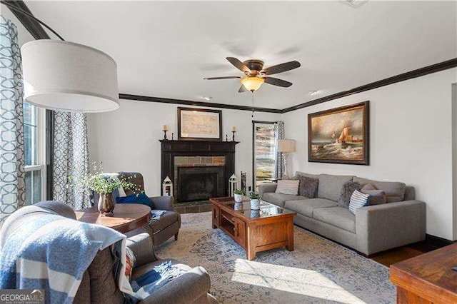 living room featuring crown molding, ceiling fan, and hardwood / wood-style floors