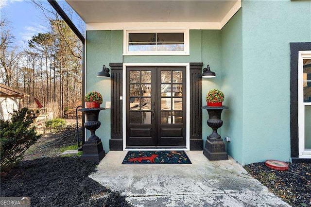 doorway to property with french doors