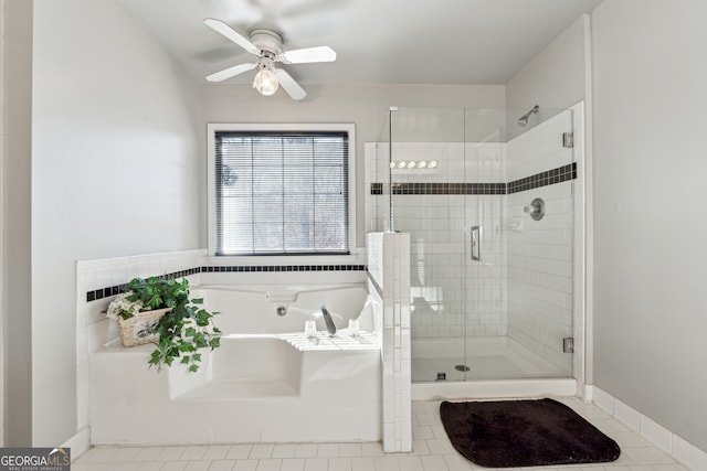 bathroom with ceiling fan, plus walk in shower, and tile patterned flooring