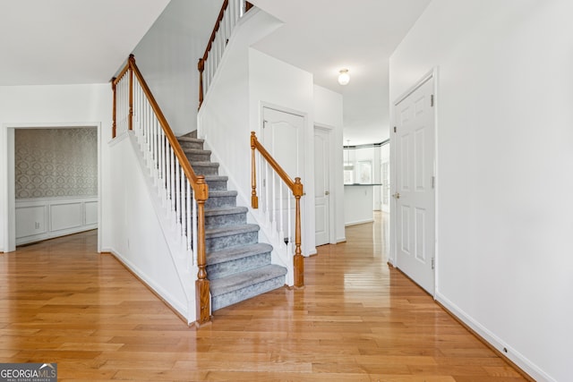 stairway with wood-type flooring