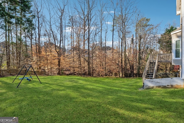 view of yard featuring a deck