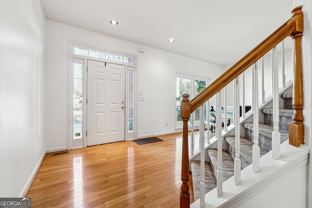 foyer entrance featuring light hardwood / wood-style flooring