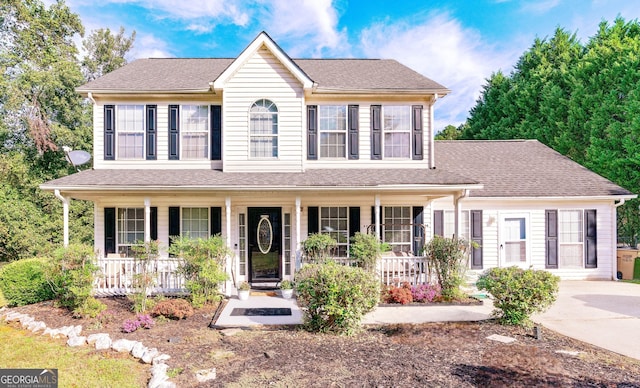 view of front of property featuring covered porch