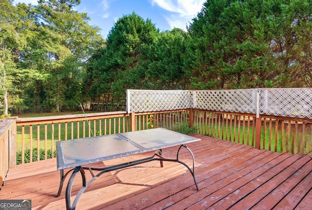 deck featuring a yard