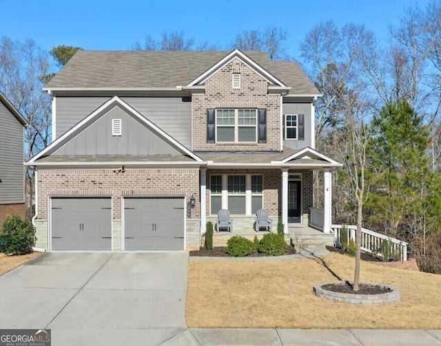 craftsman house featuring a garage and covered porch