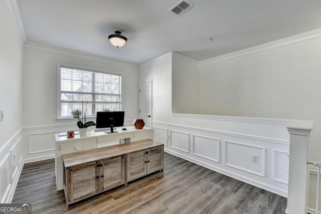 home office featuring dark wood-type flooring and ornamental molding