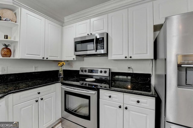 kitchen with stainless steel appliances and white cabinets