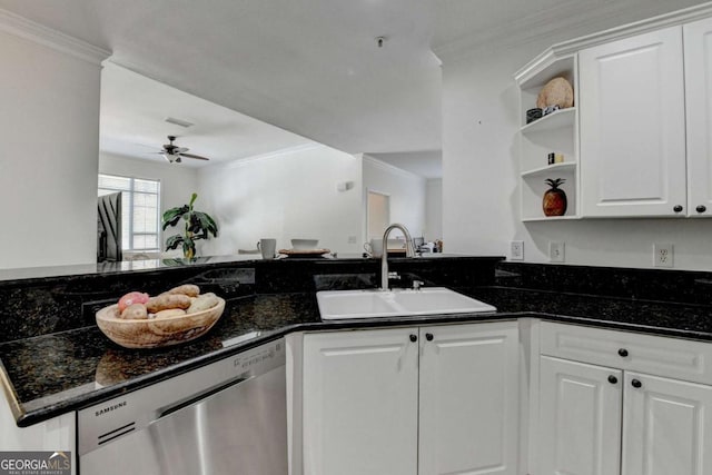 kitchen featuring dishwasher, white cabinetry, sink, dark stone counters, and ornamental molding