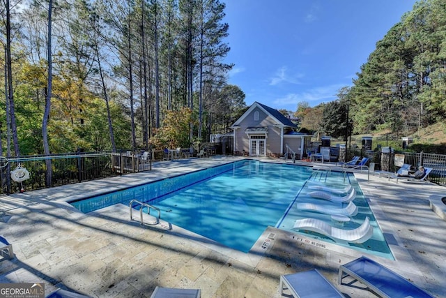 view of pool featuring a patio