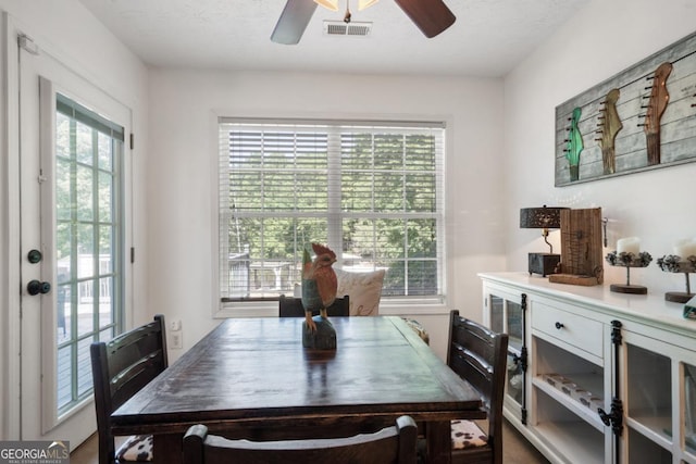 dining area with ceiling fan