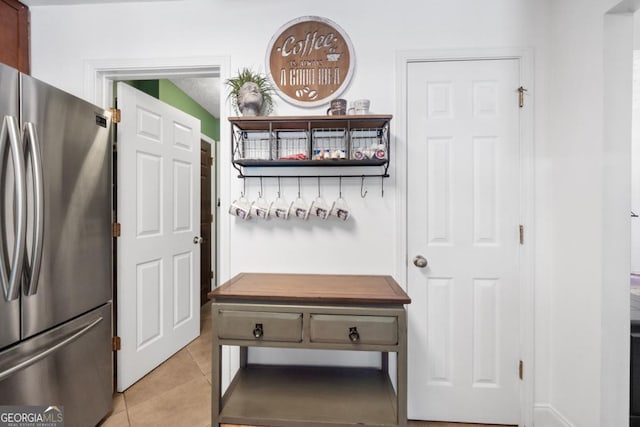 mudroom with light tile patterned floors