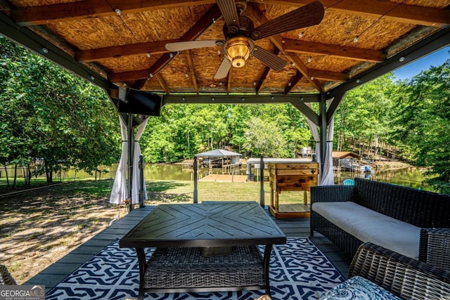 view of patio / terrace featuring a gazebo, outdoor lounge area, and ceiling fan